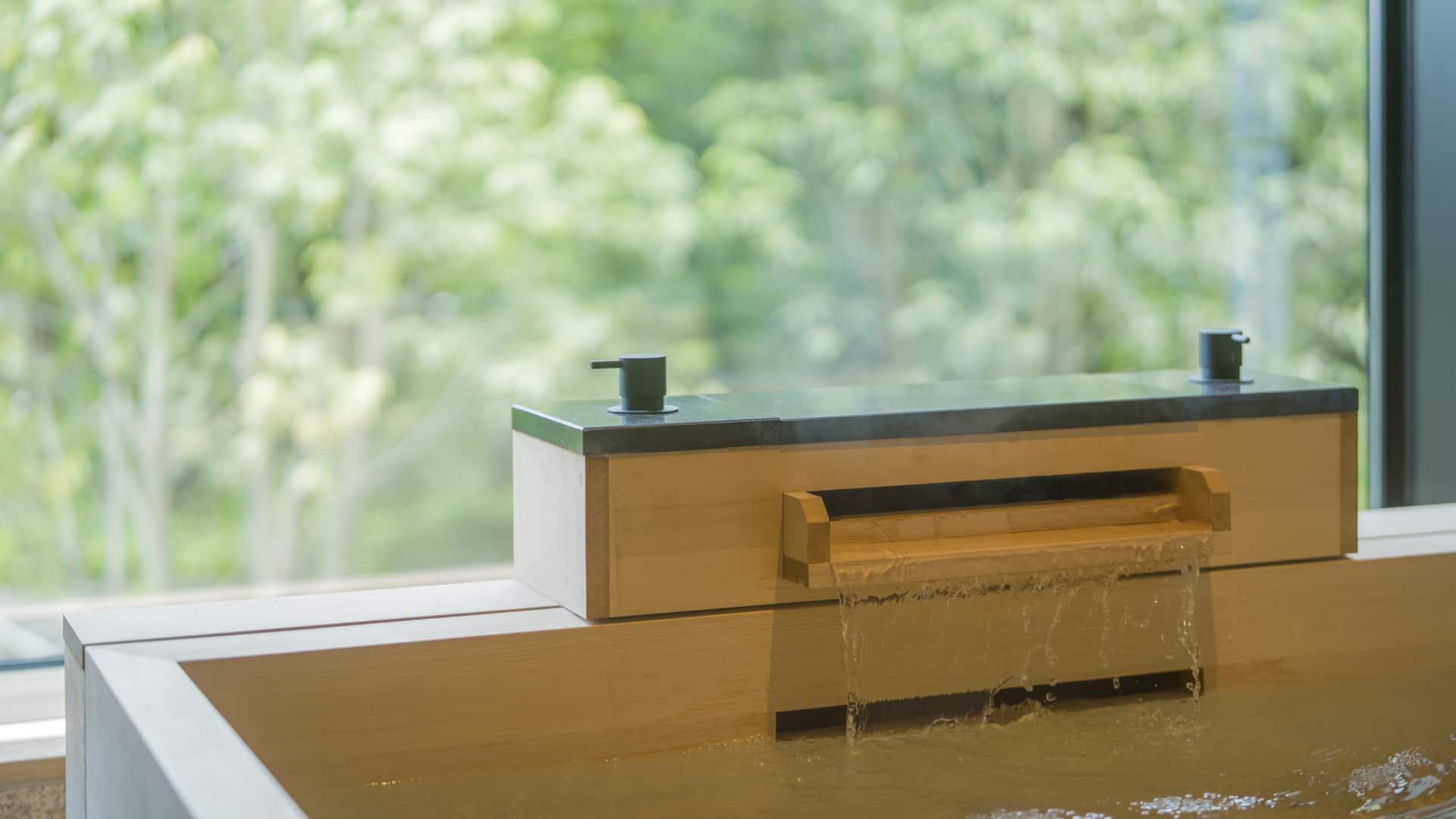 Water flowing out from an onsen tub